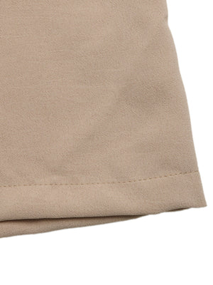 Smocked waist wide leg pants in beige cotton with a subtle texture.