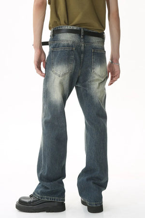 Panel seam washed denim trousers in dark blue with a relaxed fit and distressed details.