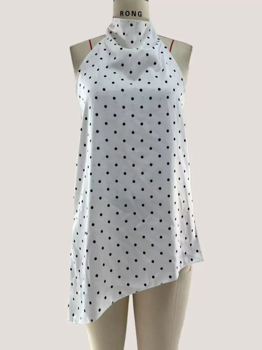 White polka dot halter top with high neck and asymmetrical hem