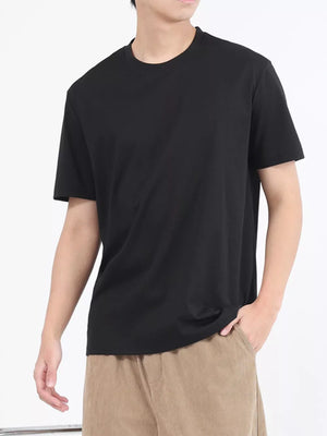 Black crew neck t-shirt with short sleeves, made of cotton.