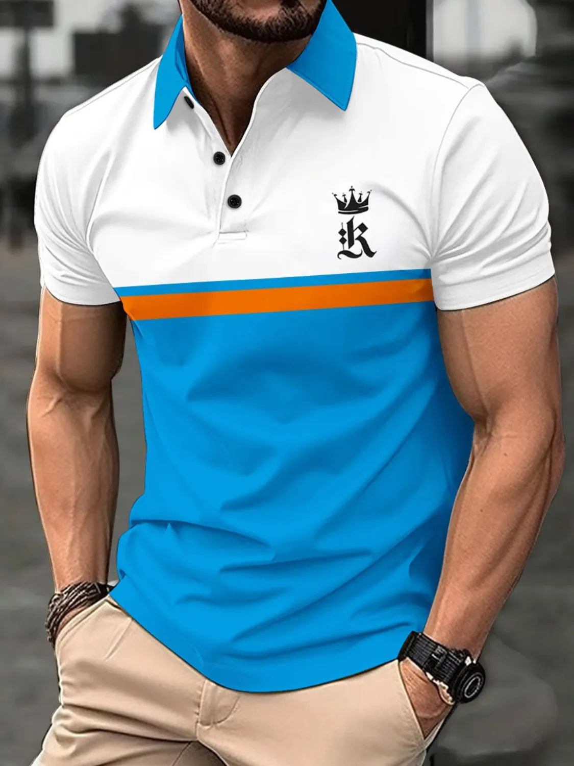 Colorblock polo shirt with crown graphic, orange stripe, and blue lower panel.