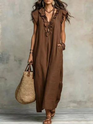 Brown ruffled V-neck maxi dress with pockets and short sleeves.