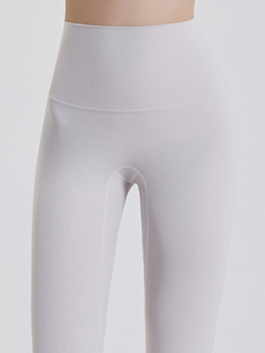 White FlexFit leggings with wide waistband and 7/8 length.