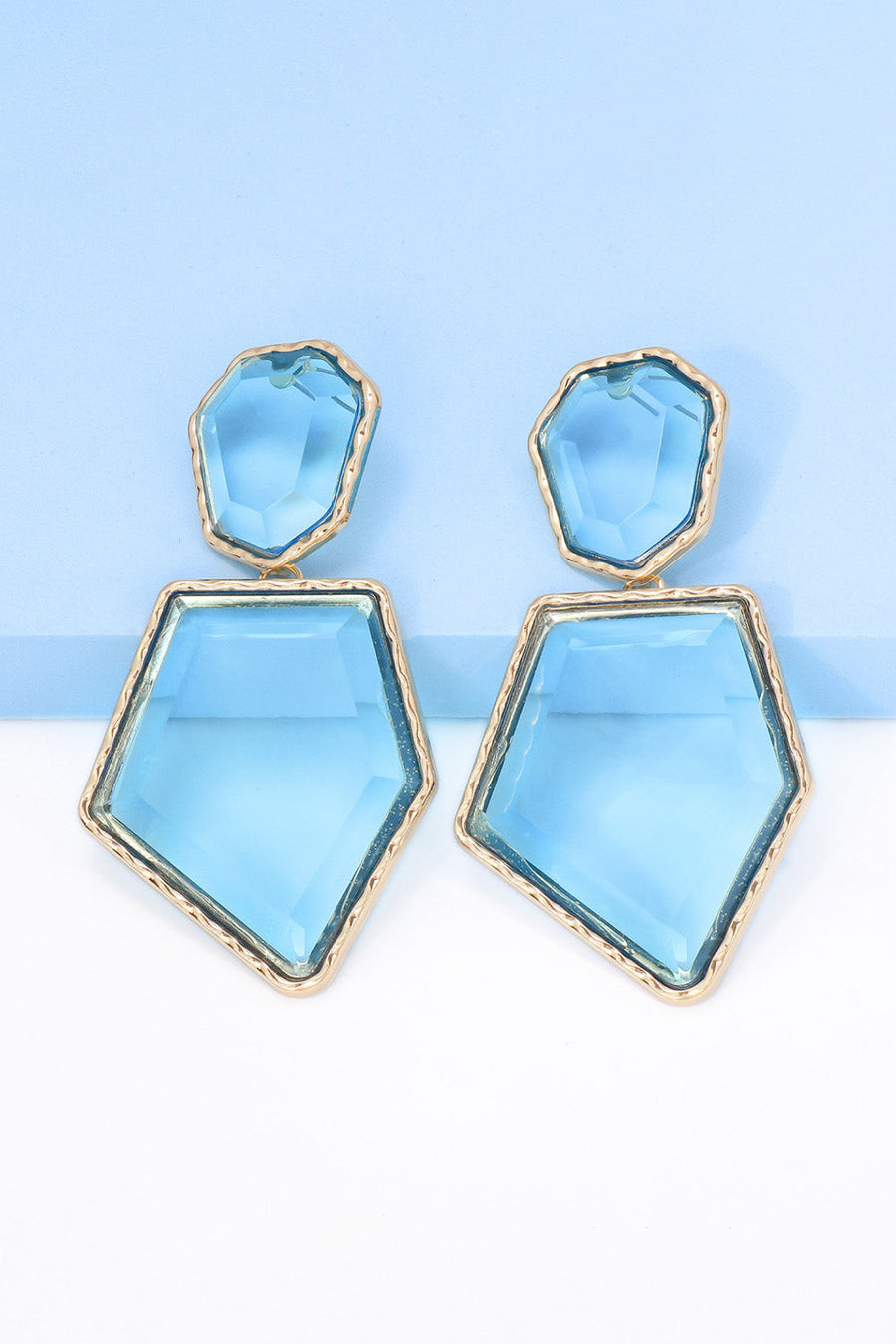 Light blue resin facet drop earrings with gold trim