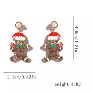 festive earrings in gold with n/a