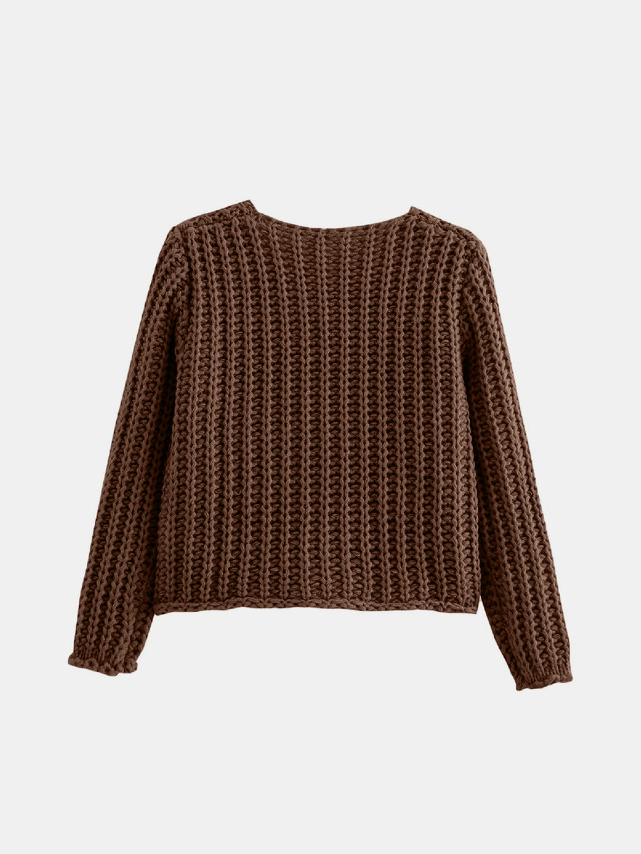 Brown chunky knit cardigan with long sleeves and ribbed cuffs.