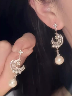 earrings in Silver with celestial and dangle