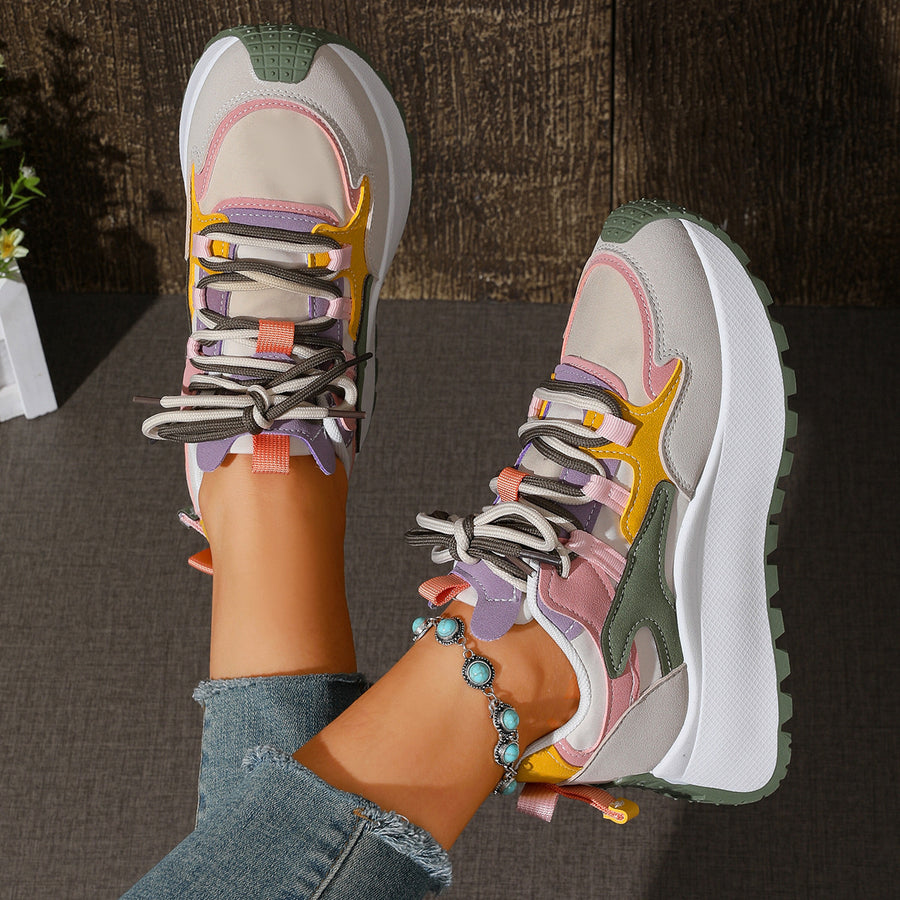Green sneakers with lace-up and color-block