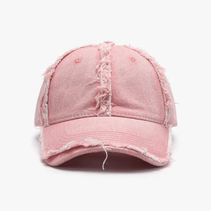 Distressed denim baseball cap in Dusty Pink with frayed edges and seams.