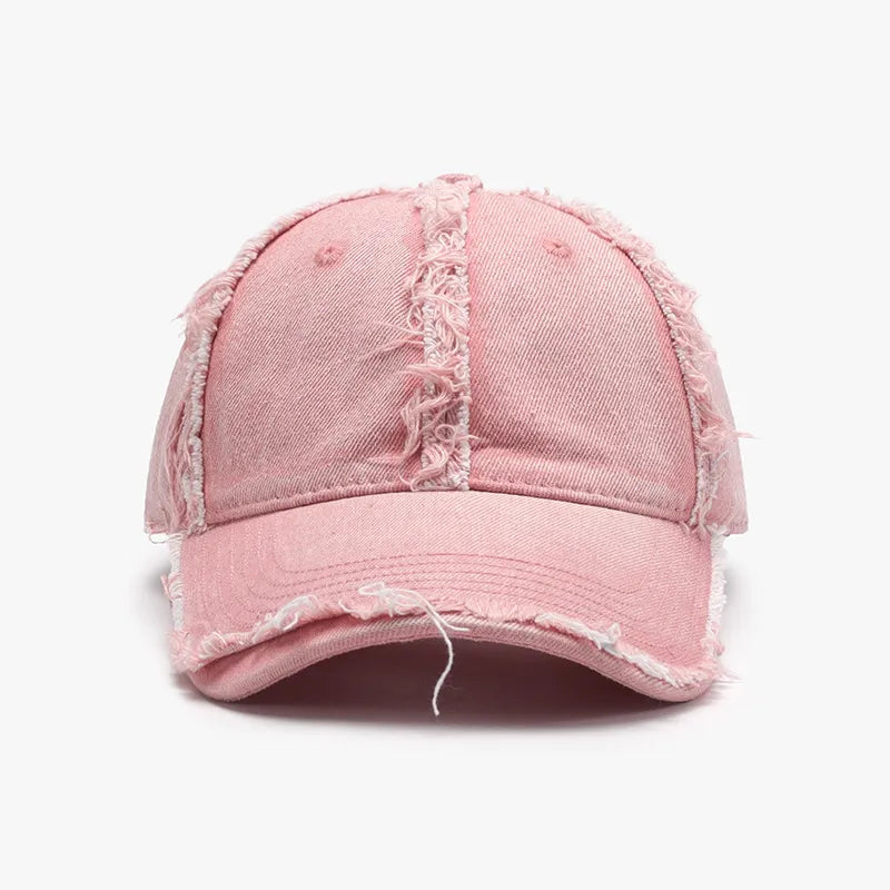 Distressed denim baseball cap in Dusty Pink with frayed edges and seams.
