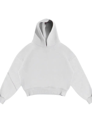Oversized white hooded sweatshirt with drop shoulders and a relaxed fit.
