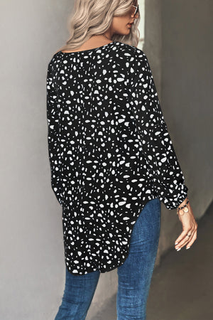 Black long sleeve blouse with white abstract print