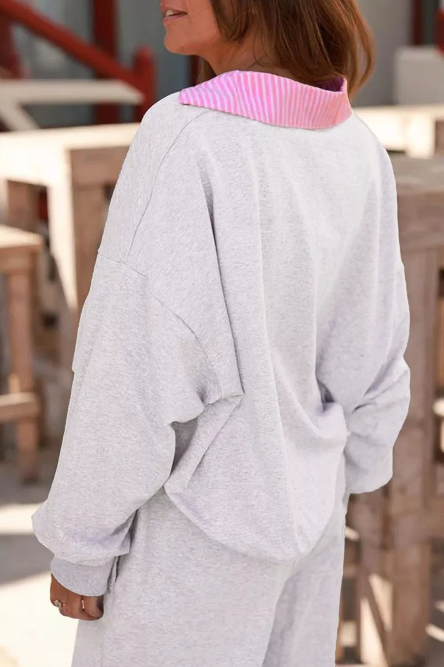 65% polyester, 35% cotton Care instructions: Machine wash cold sweatshirt and sweatpants set in light gray with relaxed