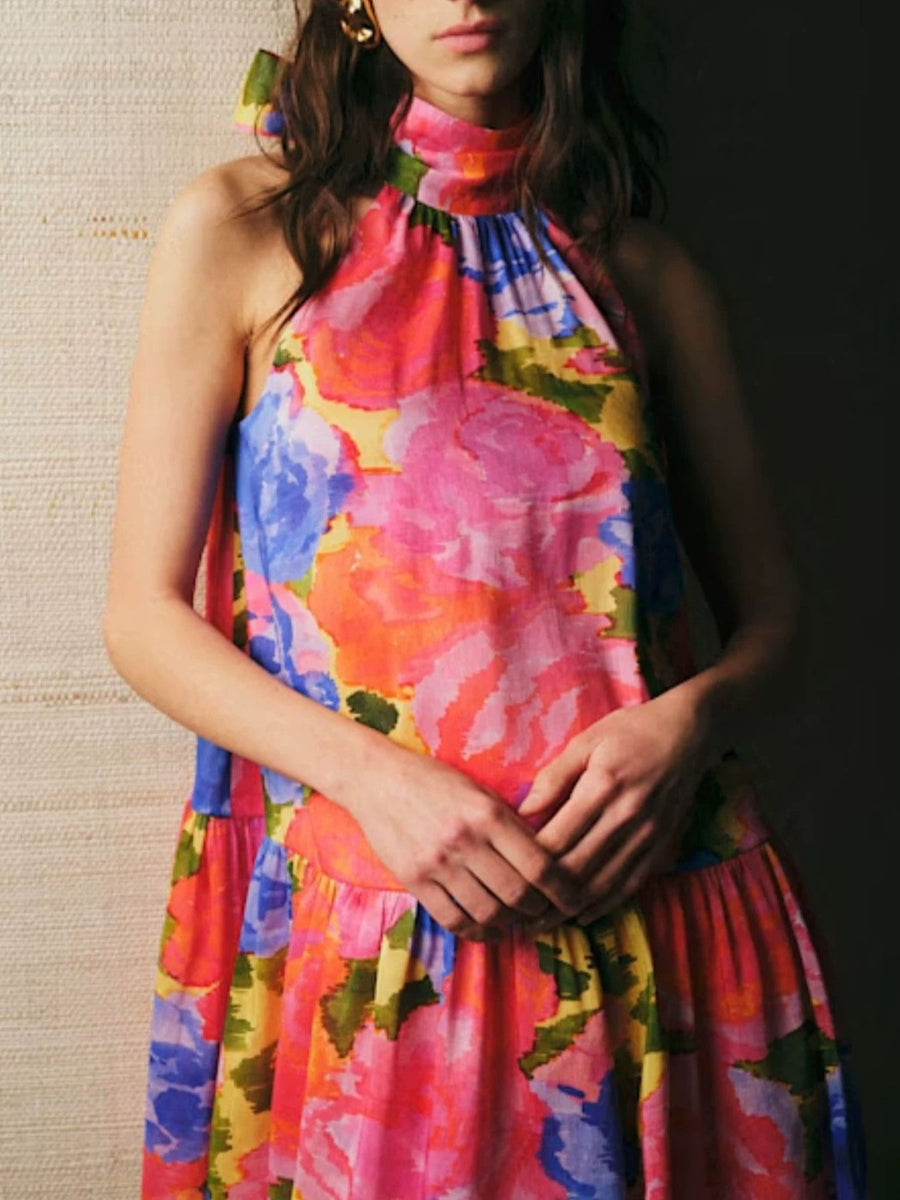 coral orange mini dress featuring bow and floral