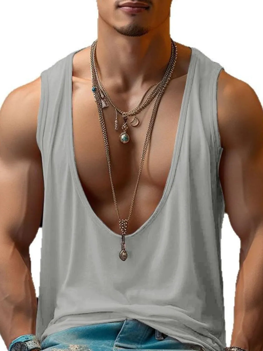Gray deep plunge tank top with layered necklaces