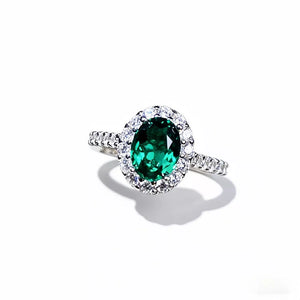 emerald green ring with synthetic emerald and n/a