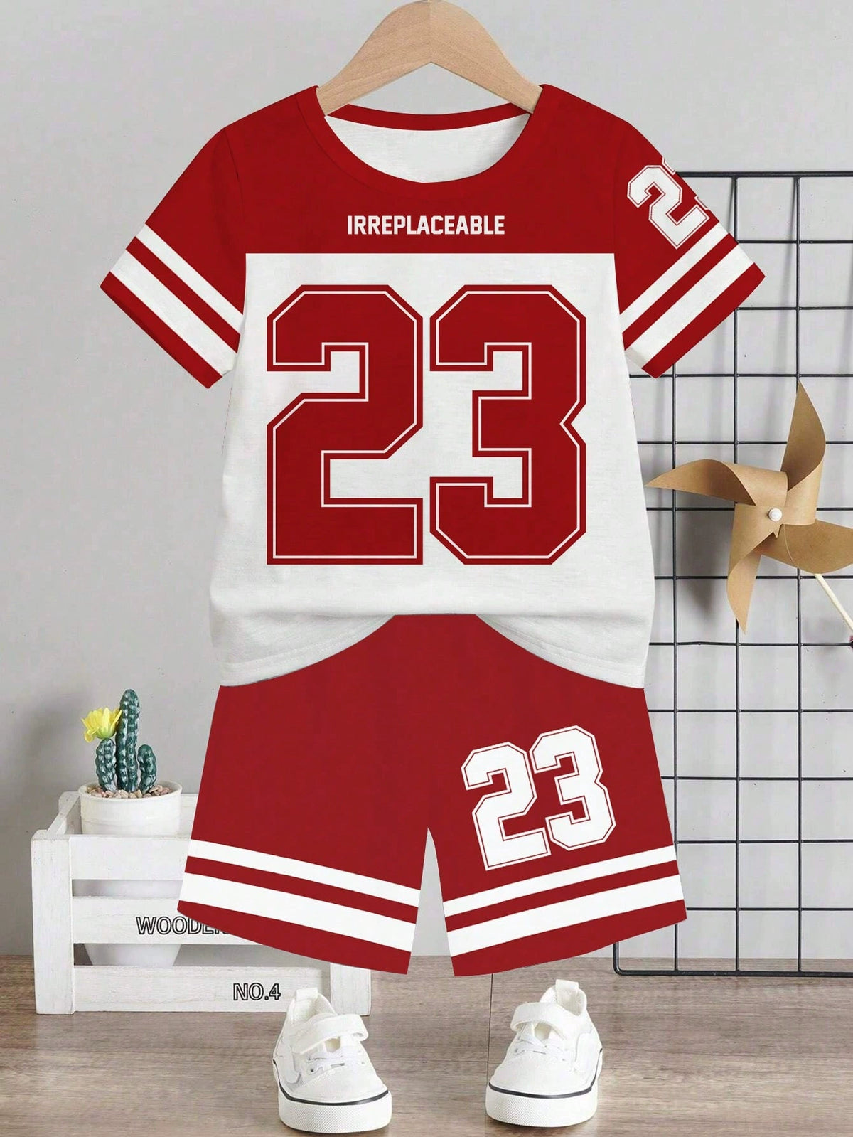 Children's red and white athletic graphic tee and shorts set with number 23