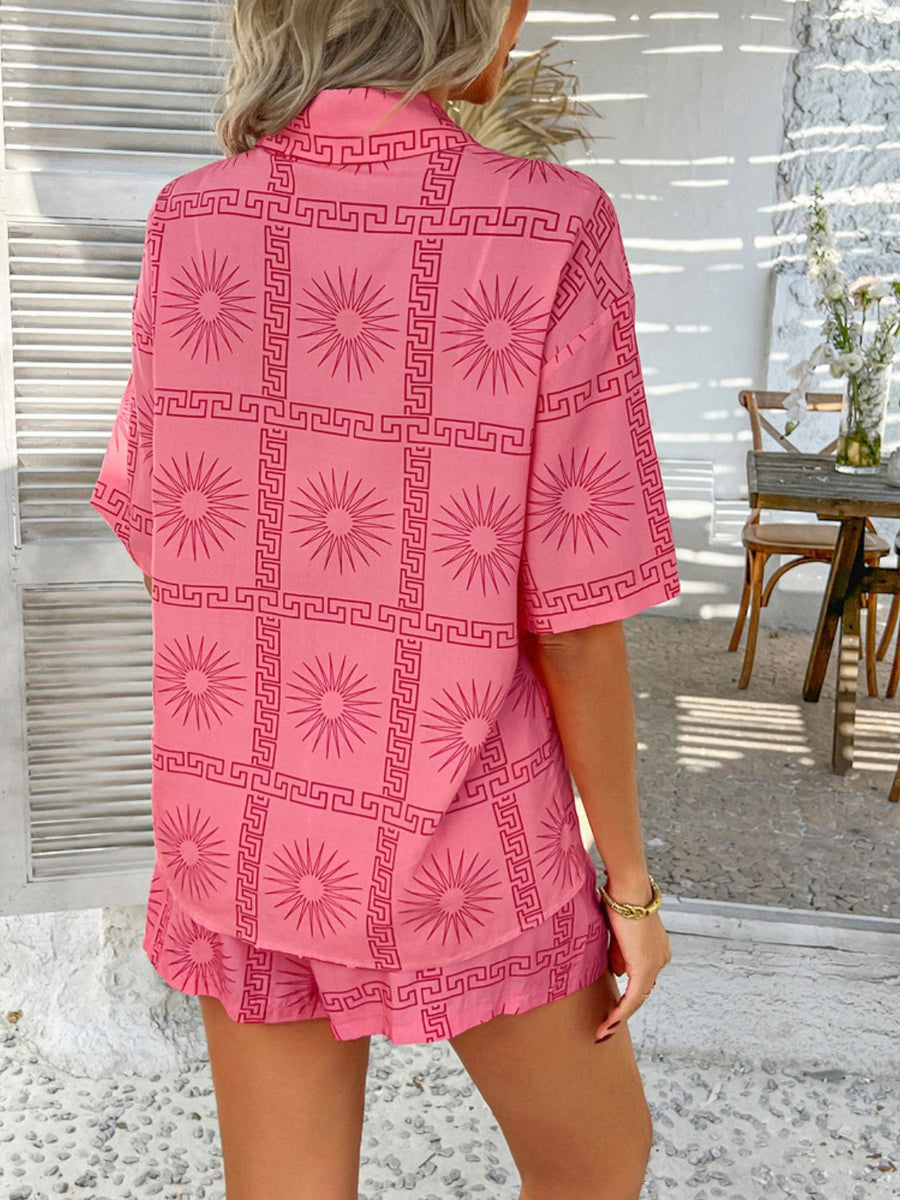 Blush Pink co-ord set with sunburst and Greek key print, short sleeves, collared shirt and shorts.