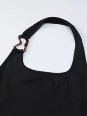 Black ribbed halter tank top with scoop neck and tortoiseshell ring detail.