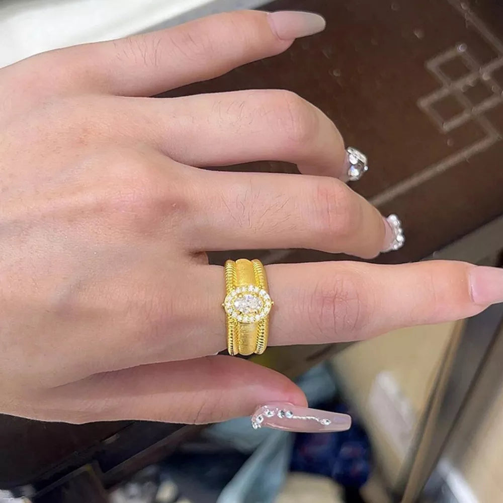 gold ring with textured and none
