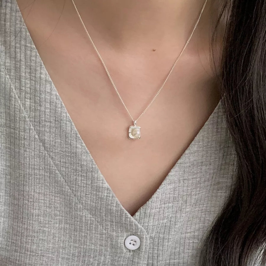 Freshwater Pearl,925 sterling silver Care instructions: Avoid wearing during exe necklace in white with NA silhouette