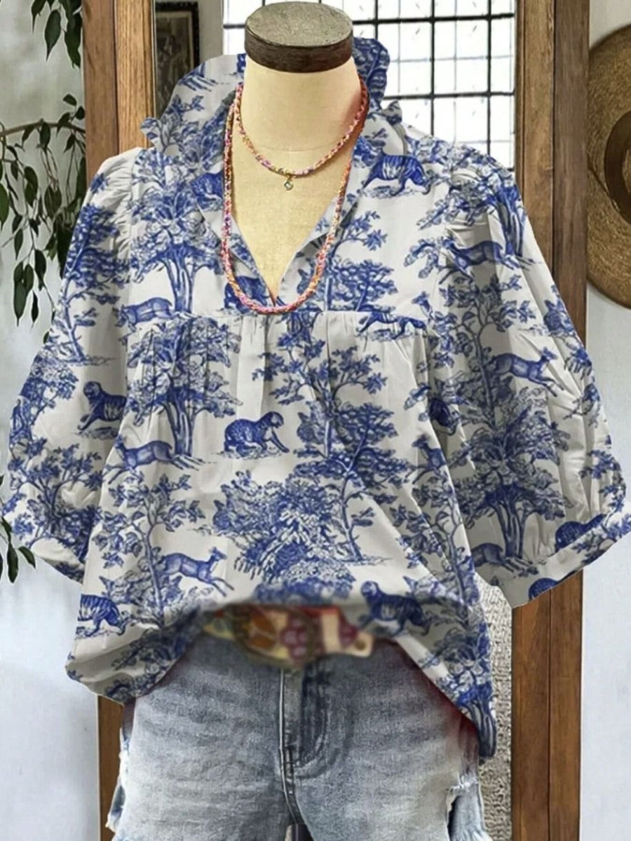 White and blue toile de Jouy half sleeve blouse with frill collar and cinched waist