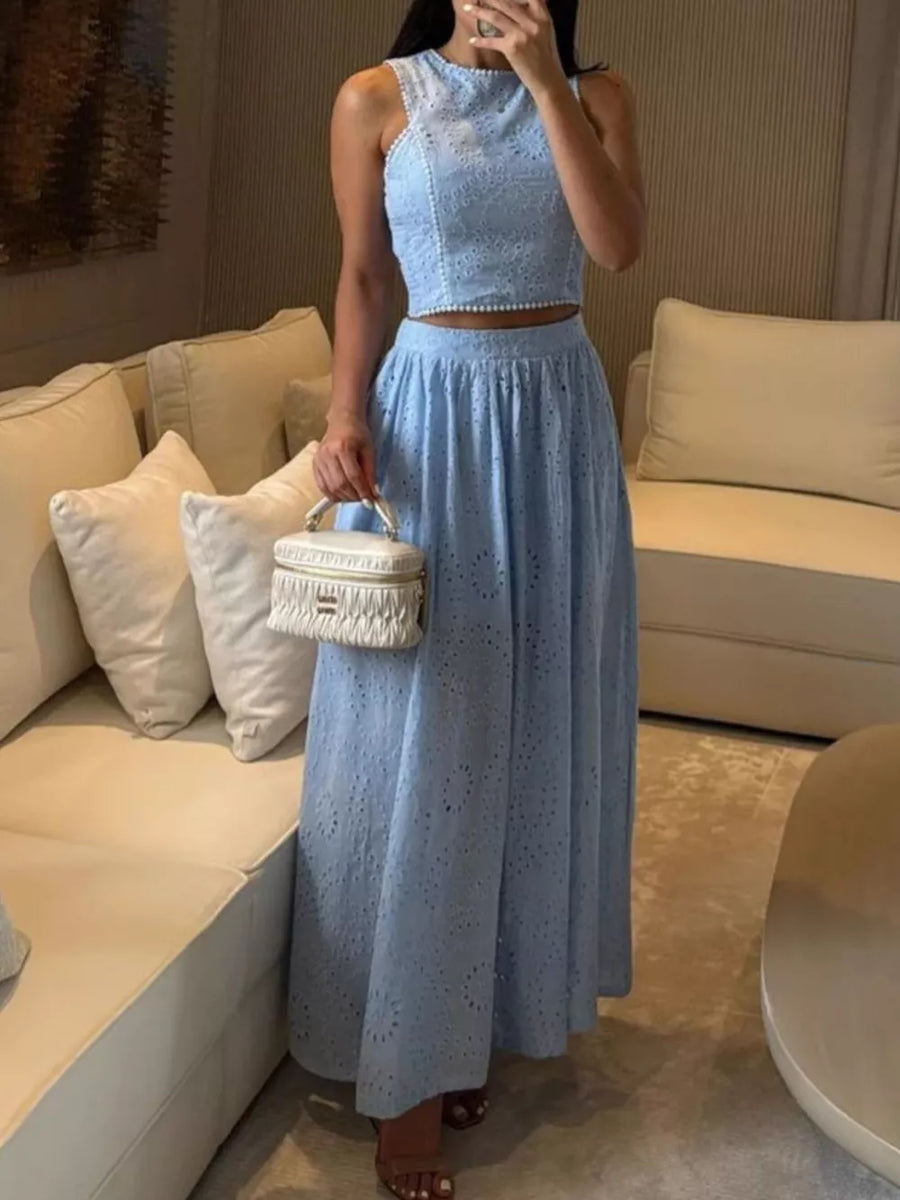 Light blue eyelet cropped top and maxi skirt set with pearl trim detail.