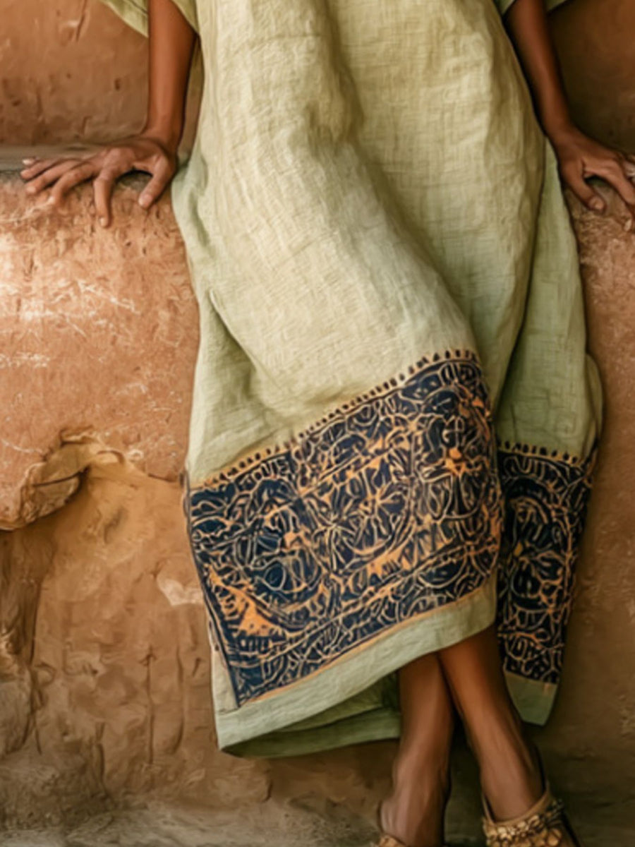 100% polyester Care instructions: Machine wash cold midi dress in ochre with loose silhouette