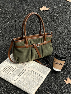 crossbody bag in olive green featuring ruched and structured fit