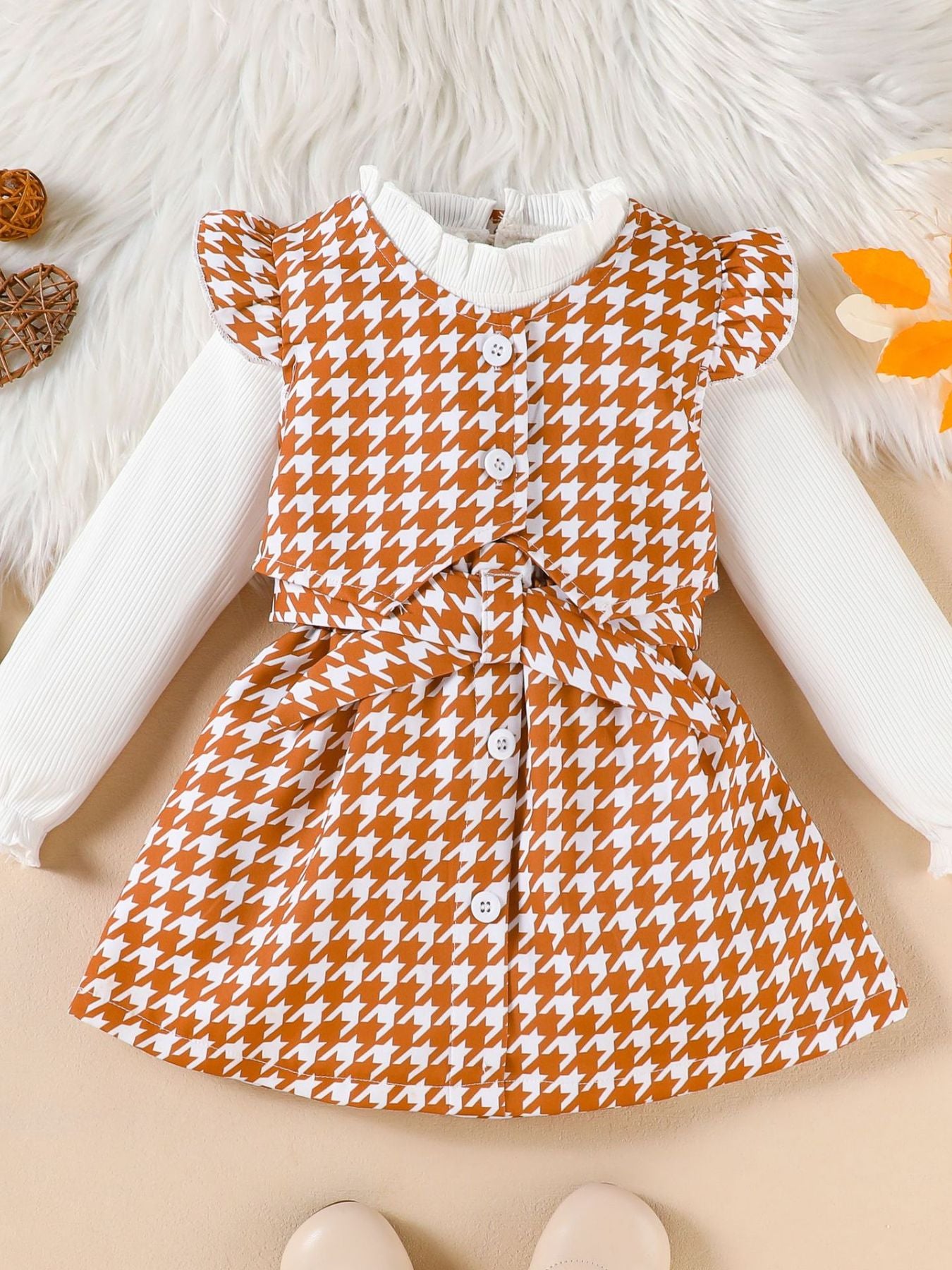 Toddler houndstooth vest and skirt set with white ribbed long sleeve shirt and bow detail