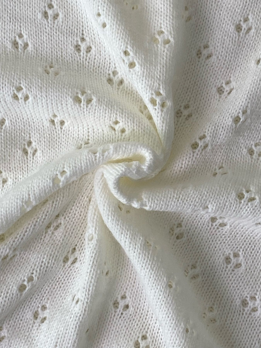 pullover sweater featuring pointelle in White with 100% polyester Care instructions: Machine wash cold texture