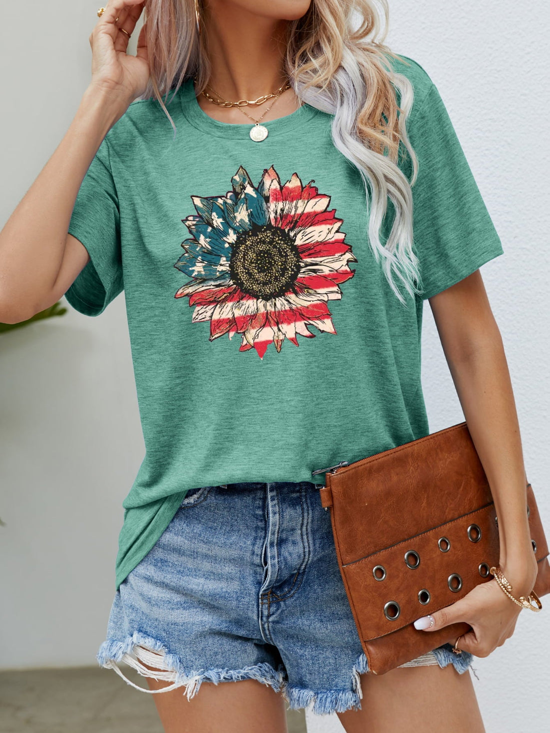 Gum Leaf green t-shirt with Americana sunflower graphic, crew neck, short sleeves.