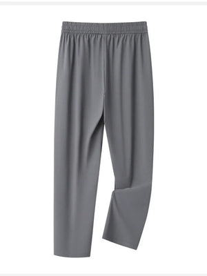 Grey sweatpants with elastic waistband and drawstring, relaxed fit for men.