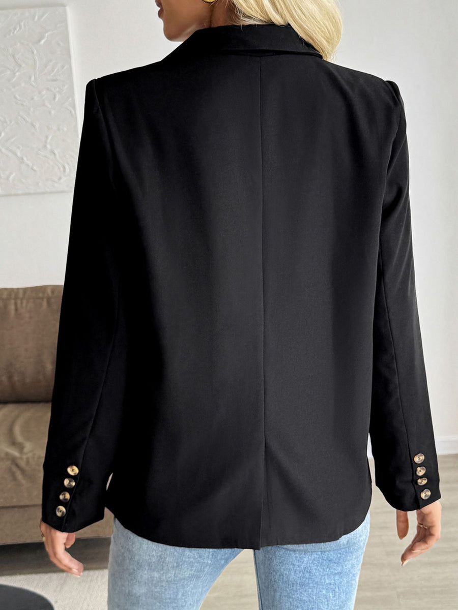 Black blazer with gold button cuffs and notched lapels
