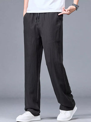 Black casual lightweight trousers with drawstring waist and pockets