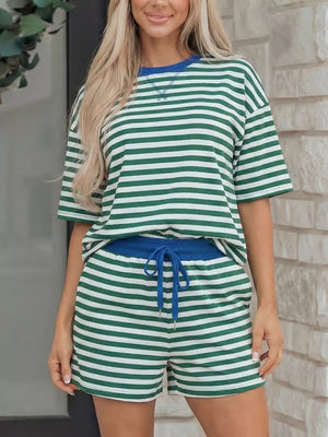 Green and white striped cotton boxy tee and shorts set with blue trim and drawstring shorts.