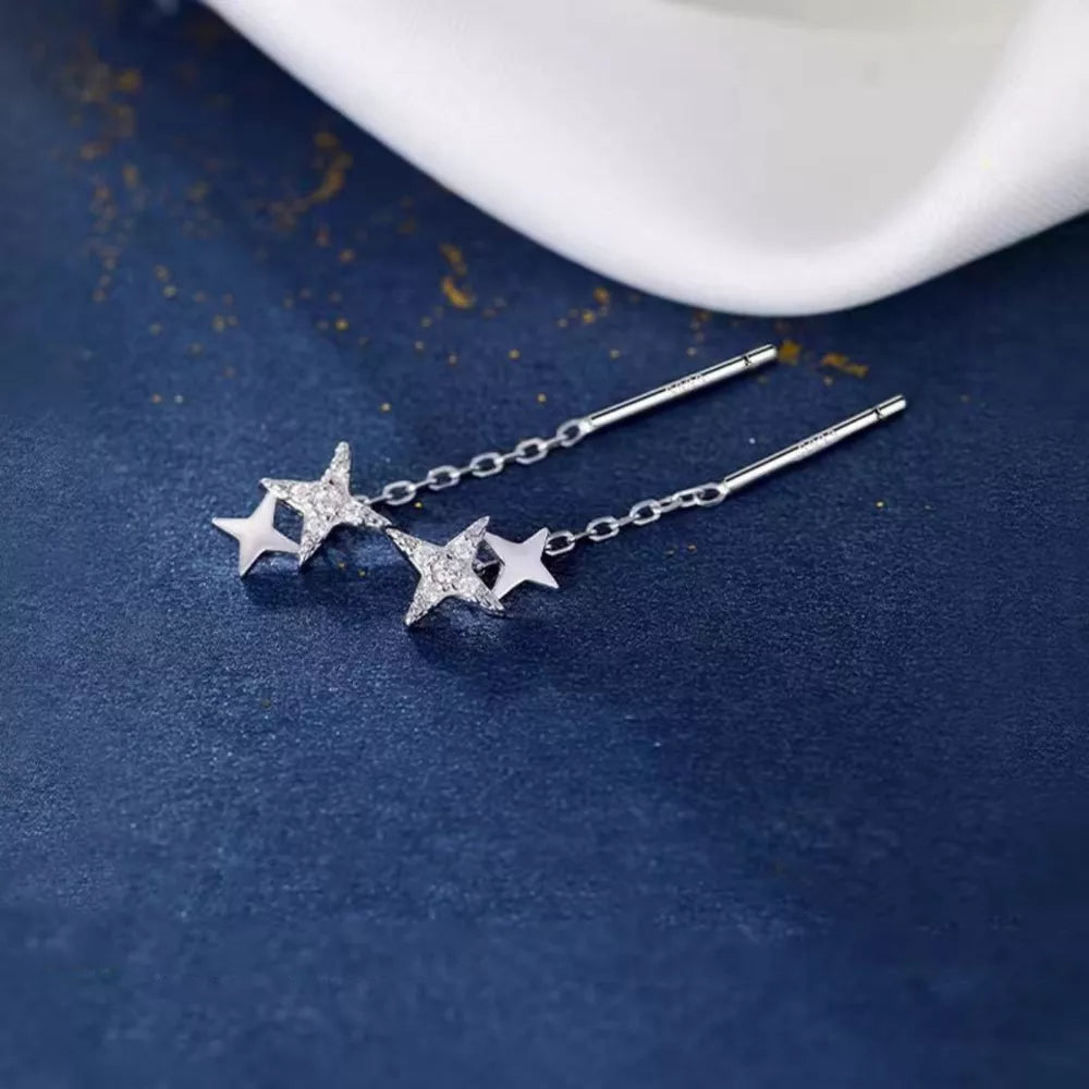 earrings in silver featuring star motif and not applicable fit