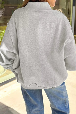 white sweatshirt featuring reversible and graphic-print