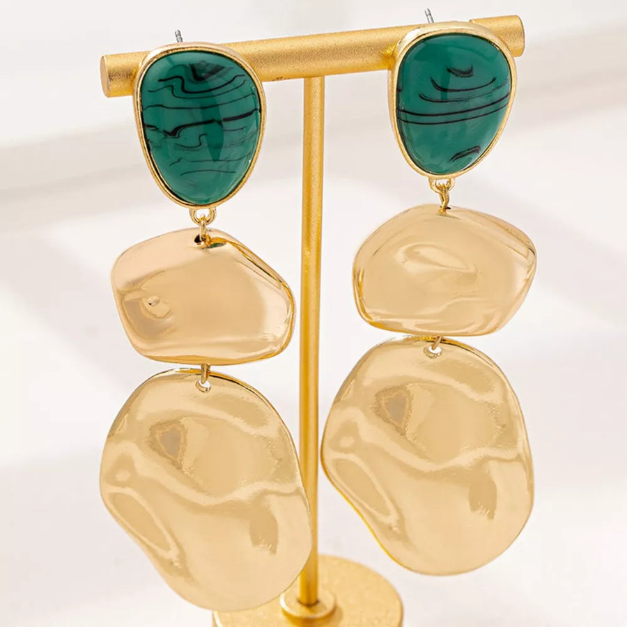 emerald green earrings featuring drop design and marbled