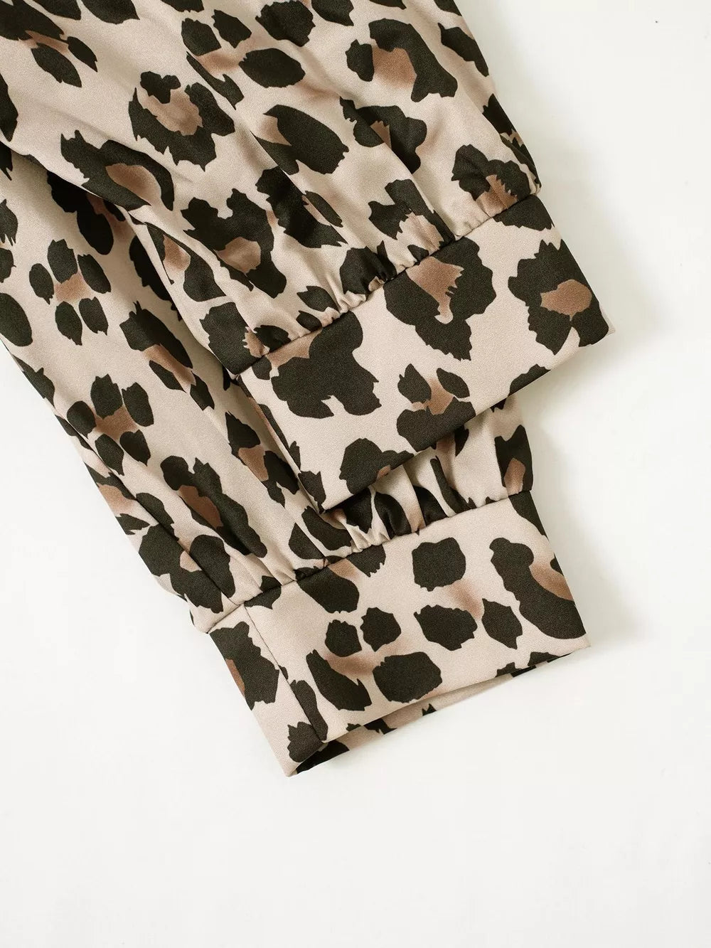 brown button-down shirt with collared and long sleeve