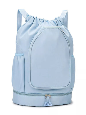 Sky Blue drawstring duffle bag with front zip pocket and dual zipper bottom compartment.