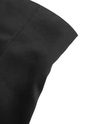 Black high-waisted pleated chino shorts with decorative button detail.