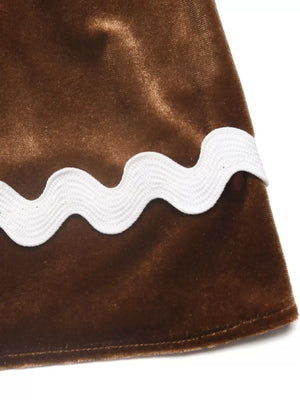Brown velvet midi skirt with white ric-rac trim detail.