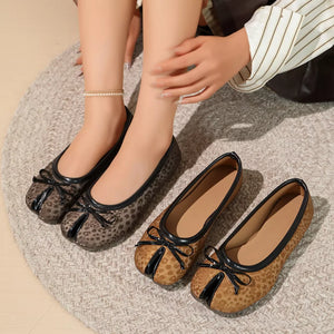 slip-ons in dark brown featuring bow detail and flat fit