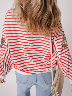 Red and white striped sweatshirt with sequin gift detail on sleeves.
