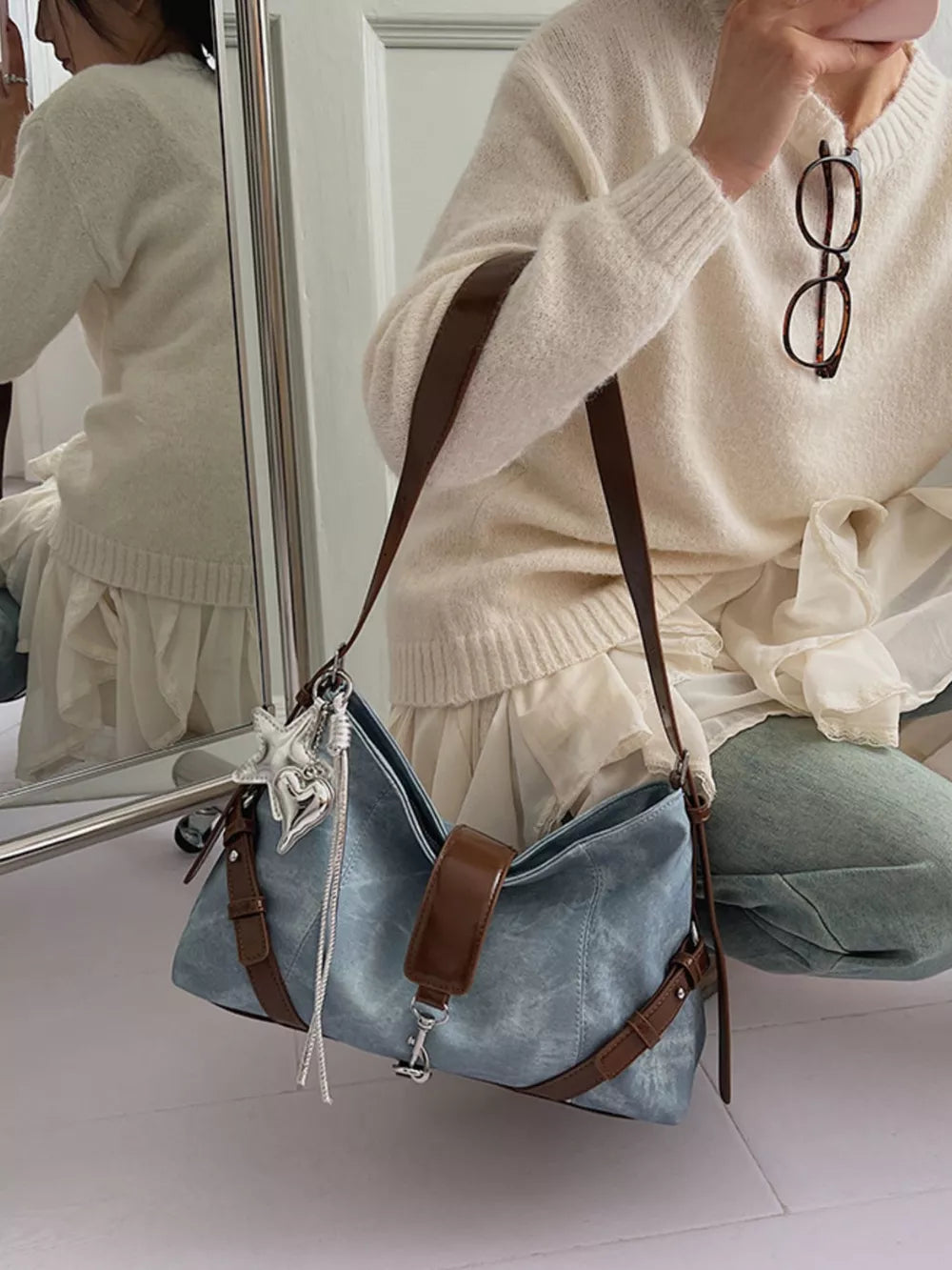 crossbody bag in brown with leather accents and medium