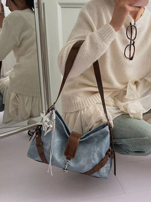 crossbody bag in brown with leather accents and medium