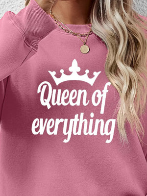 Blush Pink Queen of Everything graphic sweatshirt with crewneck and crewneck detail.