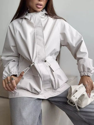 100% polyester Care instructions: Machine wash cold windbreaker in Apricot with relaxed silhouette
