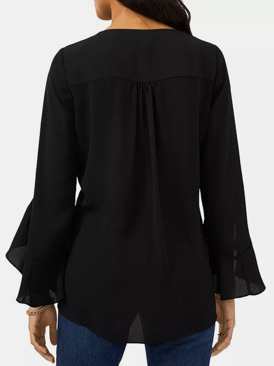 Black chiffon V-neck blouse with flared sleeves and back yoke detail.